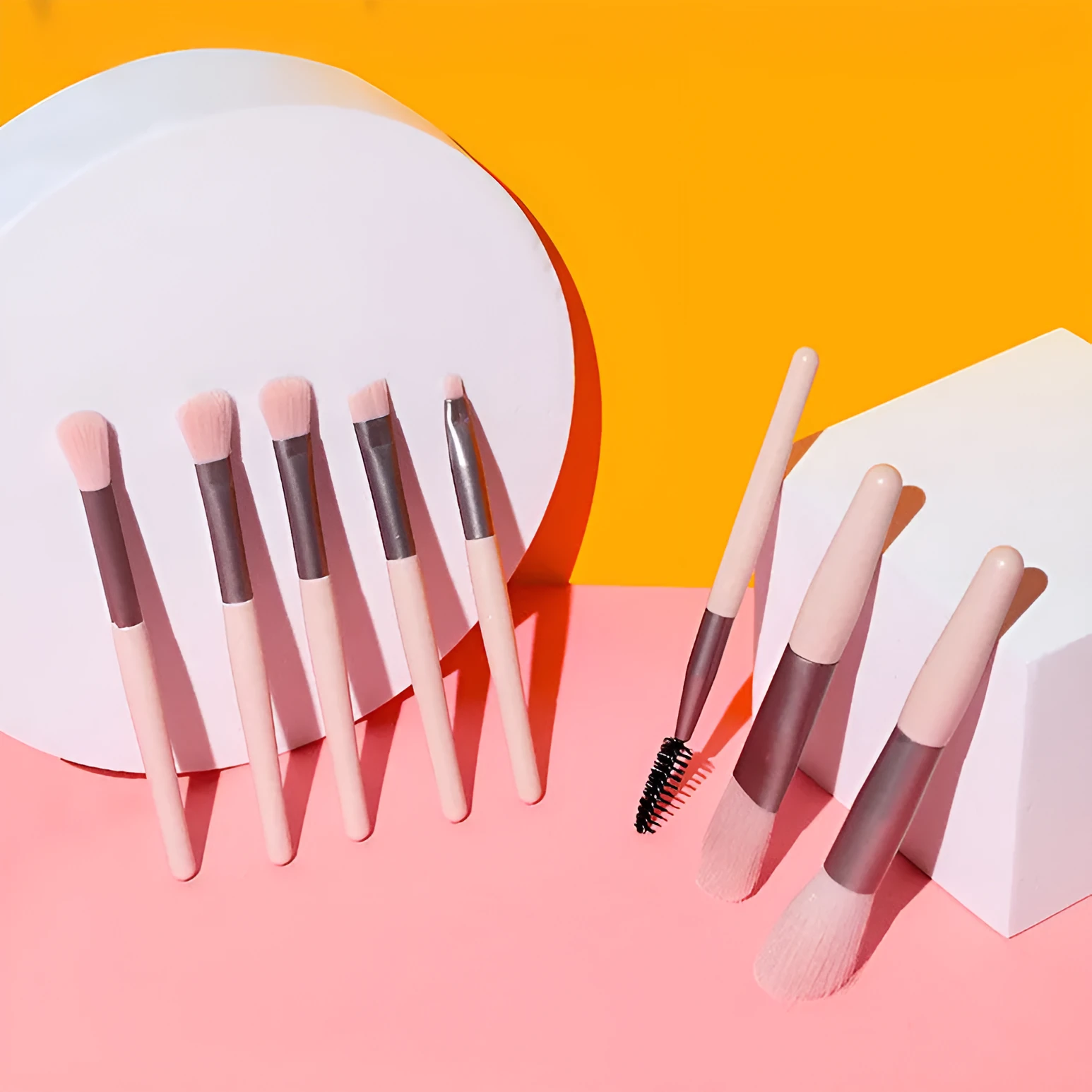 8-piece Morandi makeup brush set with fibre hair bristles in pink, blue, apricot, and green on a light background
