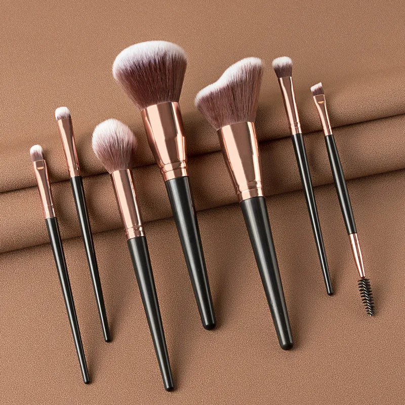 7-piece eyeshadow brush set with rayon bristles and long plastic handles in brown and black colour options