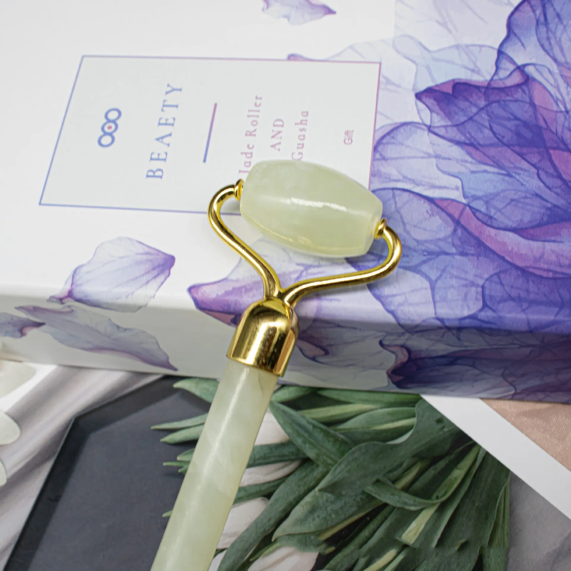 Natural green Jiayu stone double-head jade roller massager with geometric shape