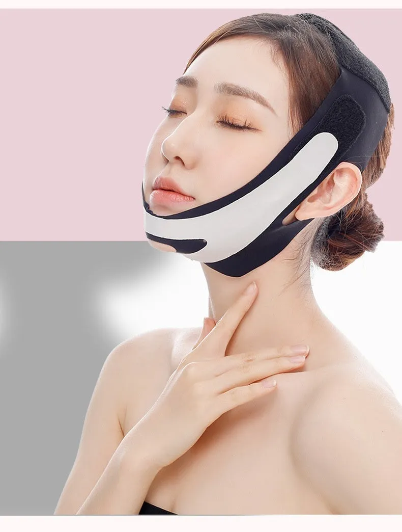 Pink elastic V-shaped face bandage with adjustable black velcro strap on a white background.