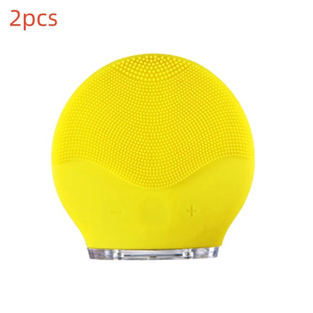 Electric waterproof silicone cleansing instrument mini facial brush in pink with USB cable