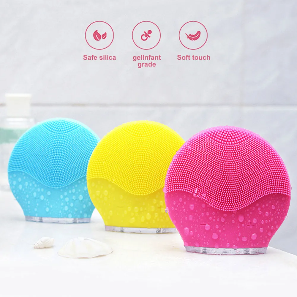 Electric waterproof silicone cleansing instrument mini facial brush in pink with USB cable