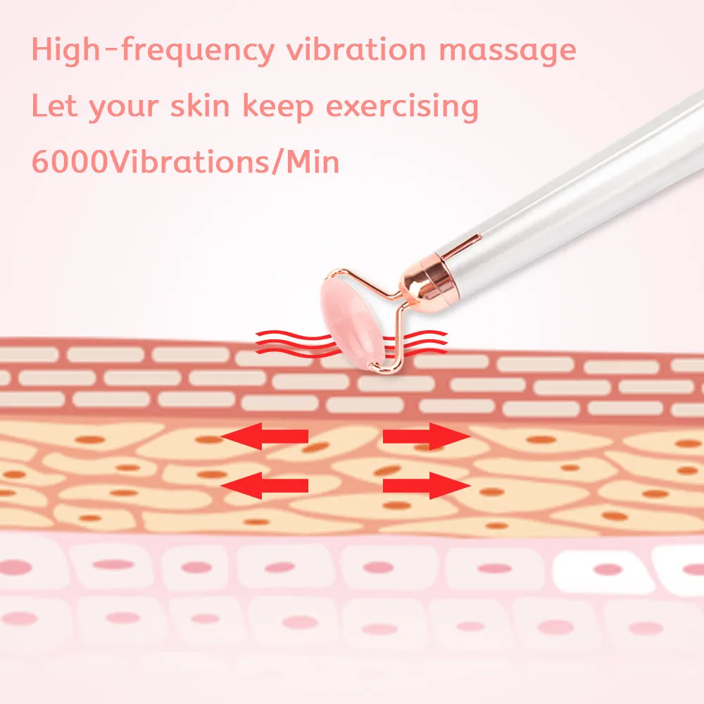 Electric vibrating rose quartz facial roller with under eye press on pink background