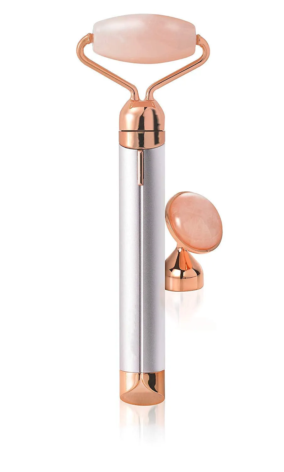 Electric vibrating rose quartz facial roller with under eye press on pink background