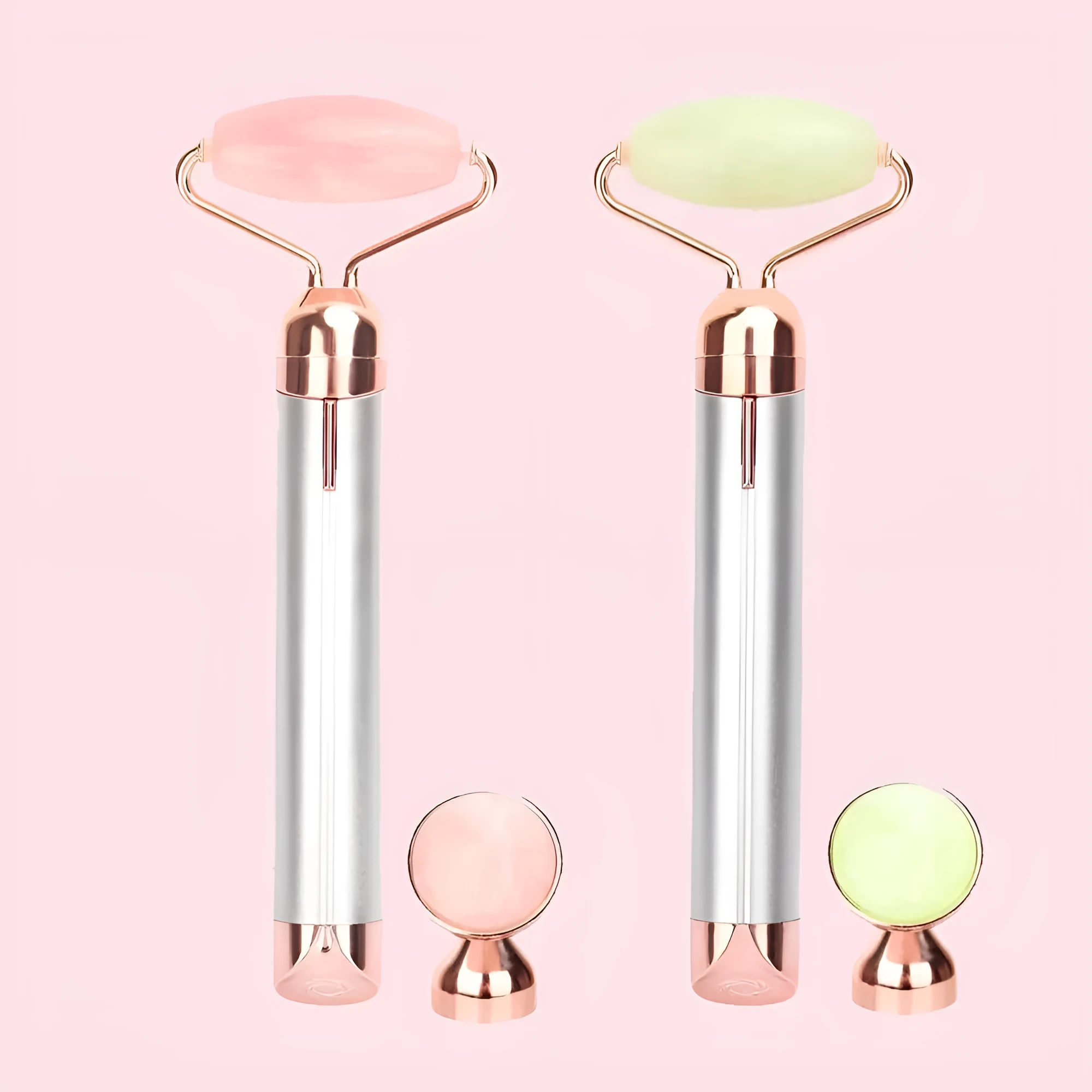 Electric vibrating rose quartz facial roller with under eye press on pink background
