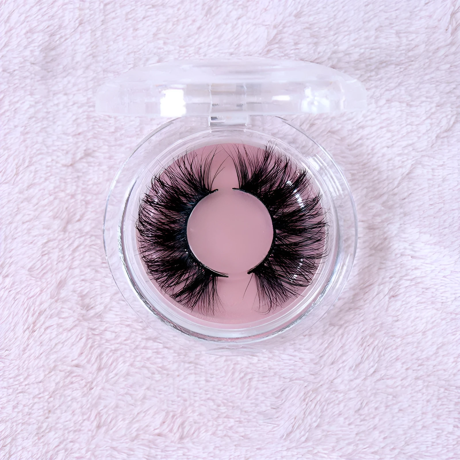 Real mink hair false eyelashes in 25MM3D length with fluffy handmade lash strands on a white background