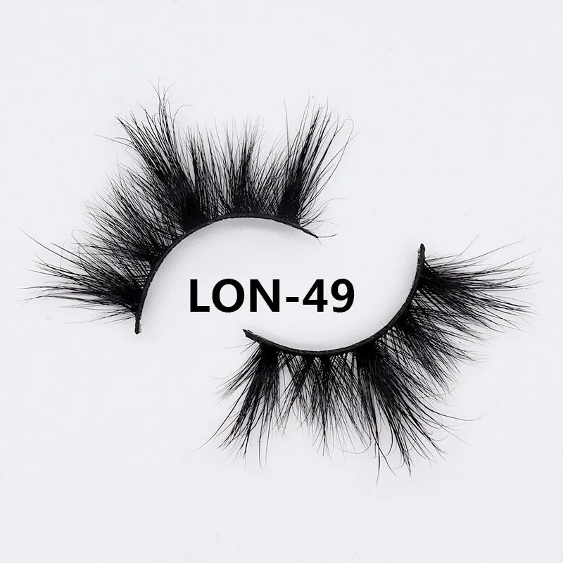 Real mink hair false eyelashes in 25MM3D length with fluffy handmade lash strands on a white background