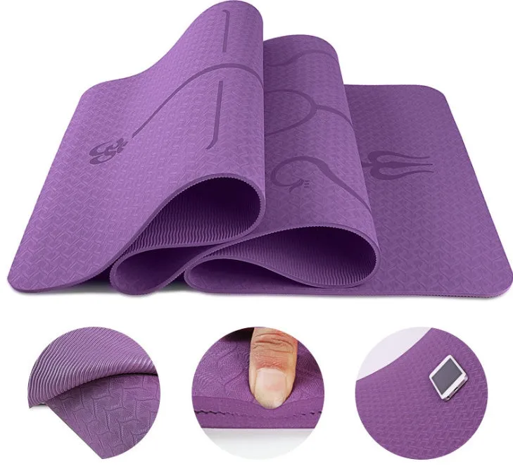 TPE yoga mat in bamboo blue with body position line, 6mm thick, rolled out on a wooden floor