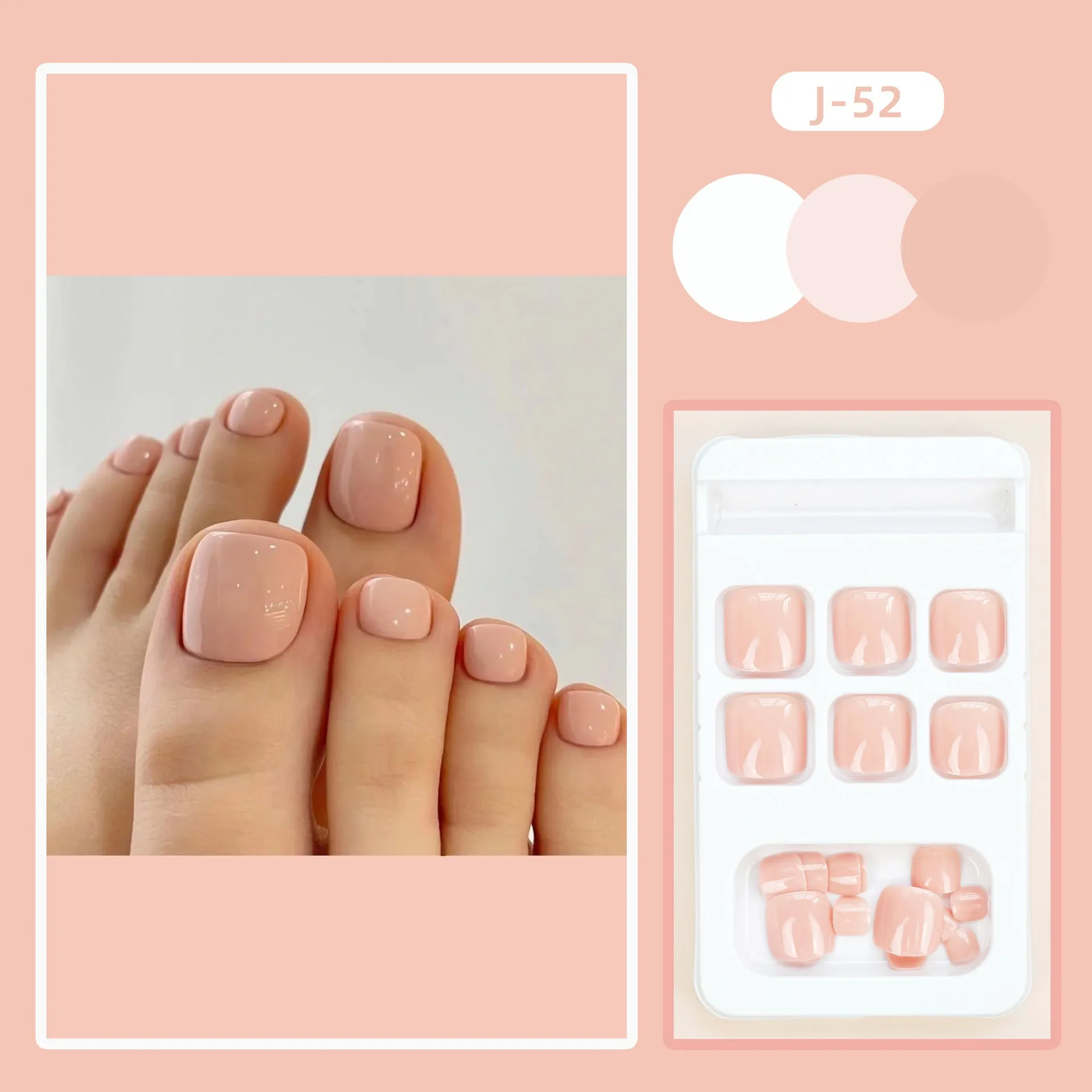 Finished plastic toe nail stickers in J-52 skin colour with glue tube on white background.