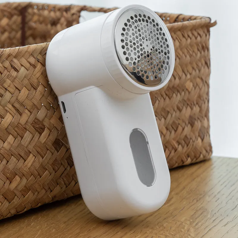 Portable white rechargeable electric lint remover trimmer with stainless steel blade