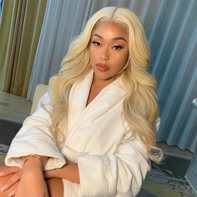 Medium length curly lace front wig with pre-plucked transparent lace frontal in natural black colour