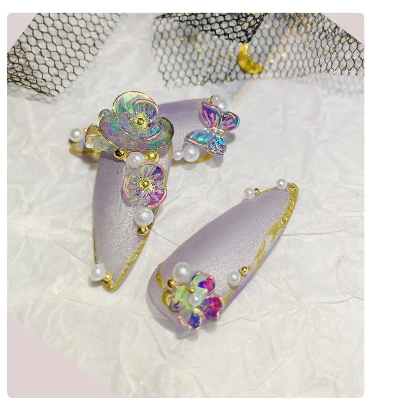 Jar of nail sequins with flower and butterfly shapes in 6 colours, 15g net content