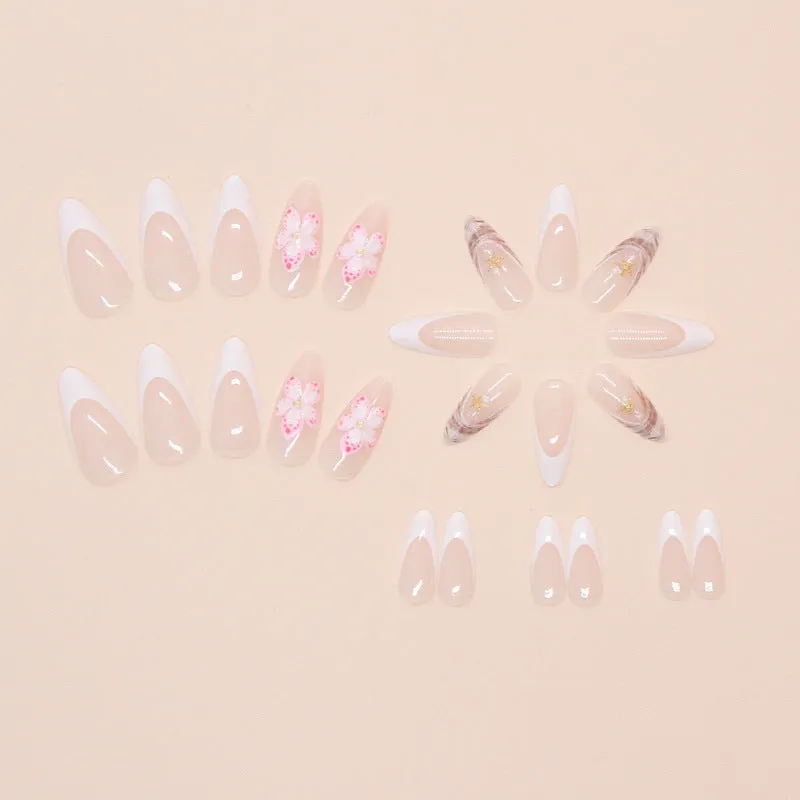 Removable fake nails with simple flower French style and rock pattern patch design in a plastic kit.