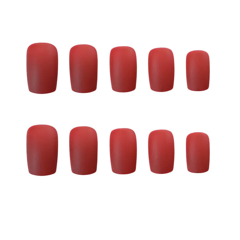 24 false nails in matte red medium length with glue adhesive in packaging