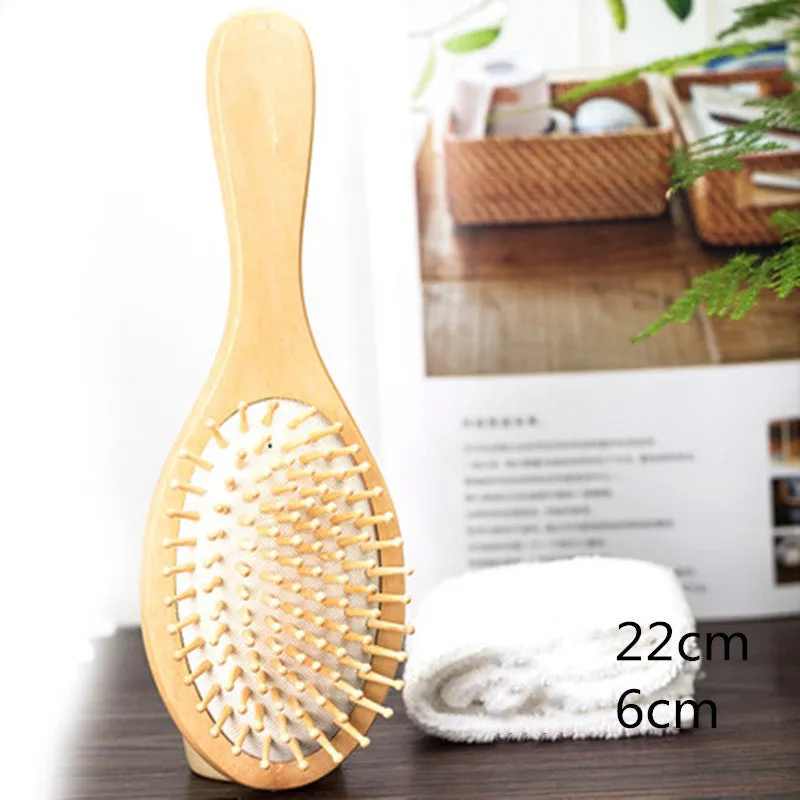 Wooden paddle cushion hairbrush with cushioned bristles, 22cm length for scalp massage and detangling