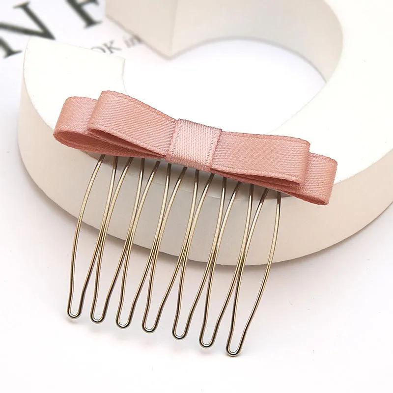 Retro bow hair comb with inlaid crystal decoration, available in six colours and two size options
