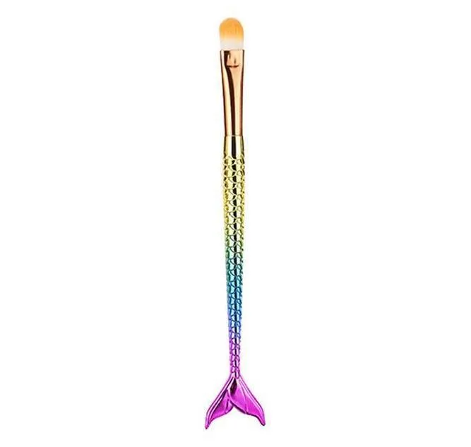 10 mermaid makeup brushes with multicolour nylon bristles and plastic handles laid flat