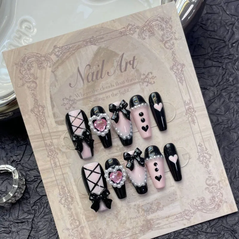 Black pink heart hand-painted artificial nails with bow patterns and cat's eye finish