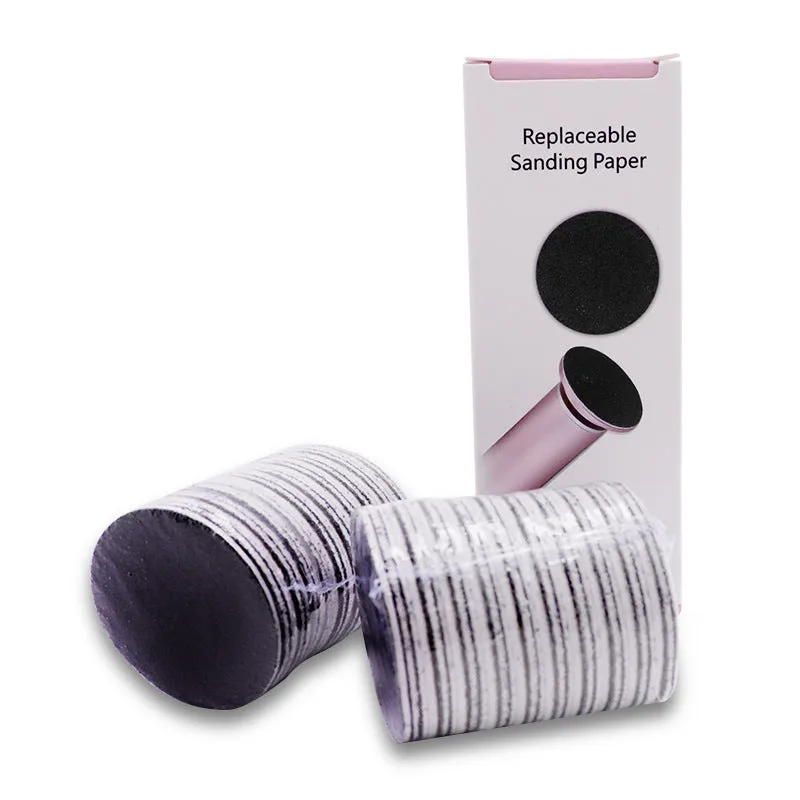Electric foot callus remover with sandpaper disc attached for removing dead skin and calluses from heels