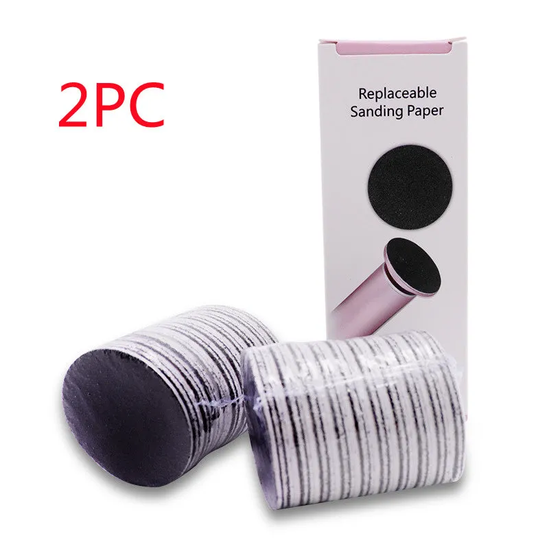 Electric foot callus remover with sandpaper disc attached for removing dead skin and calluses from heels