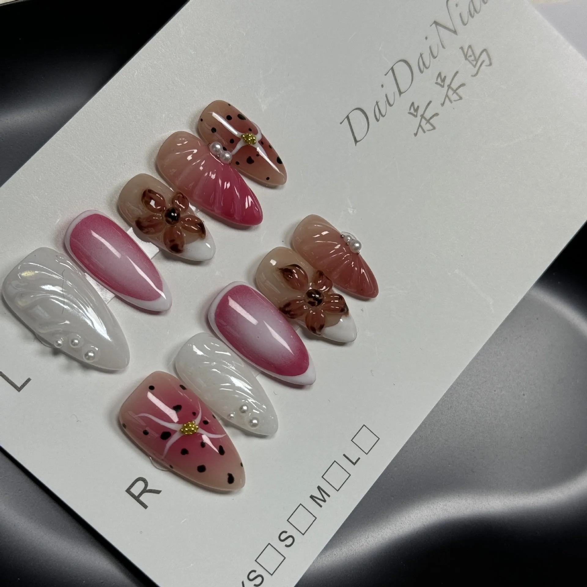 Nail art beauty patches with hand-painted 3D carved designs and embossed candy patterns