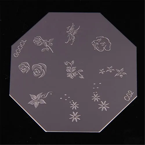 Manual nail art stamping printing machine with sucker base and six stainless steel pattern plates on a desk