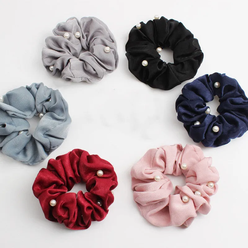 Set of 6 cloth-covered rubber hair rings in black, dark blue, grey, light blue, pink, and red