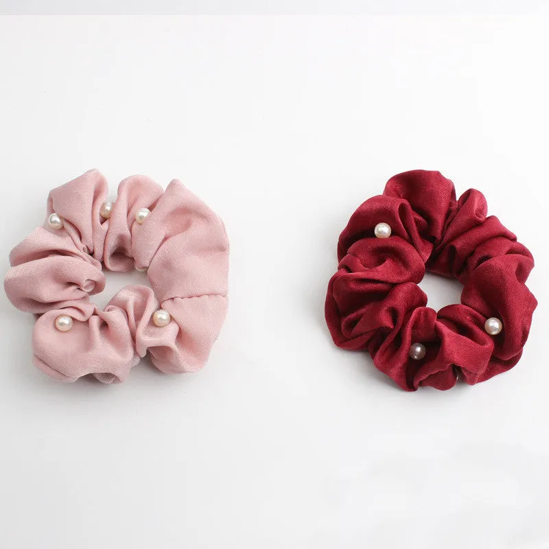 Set of 6 cloth-covered rubber hair rings in black, dark blue, grey, light blue, pink, and red