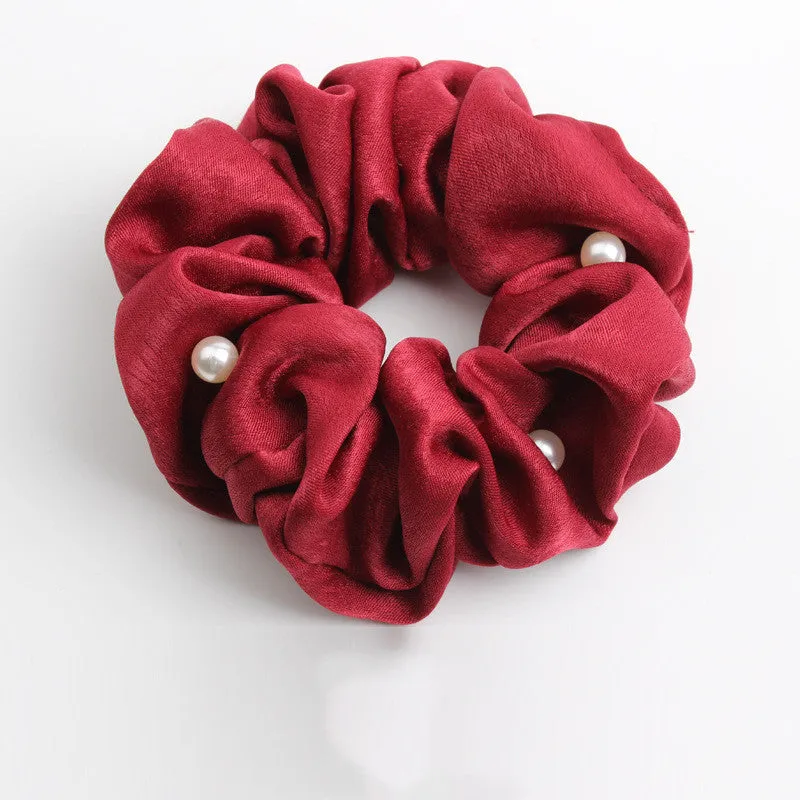 Set of 6 cloth-covered rubber hair rings in black, dark blue, grey, light blue, pink, and red