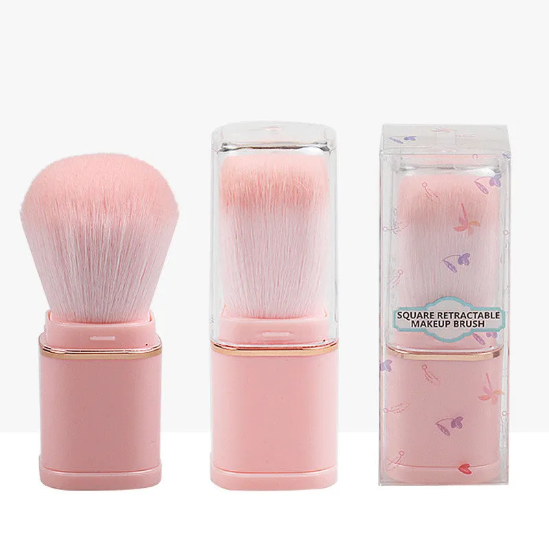 Portable retractable makeup brush with black telescopic handle and artificial fibre bristles for powder blusher application