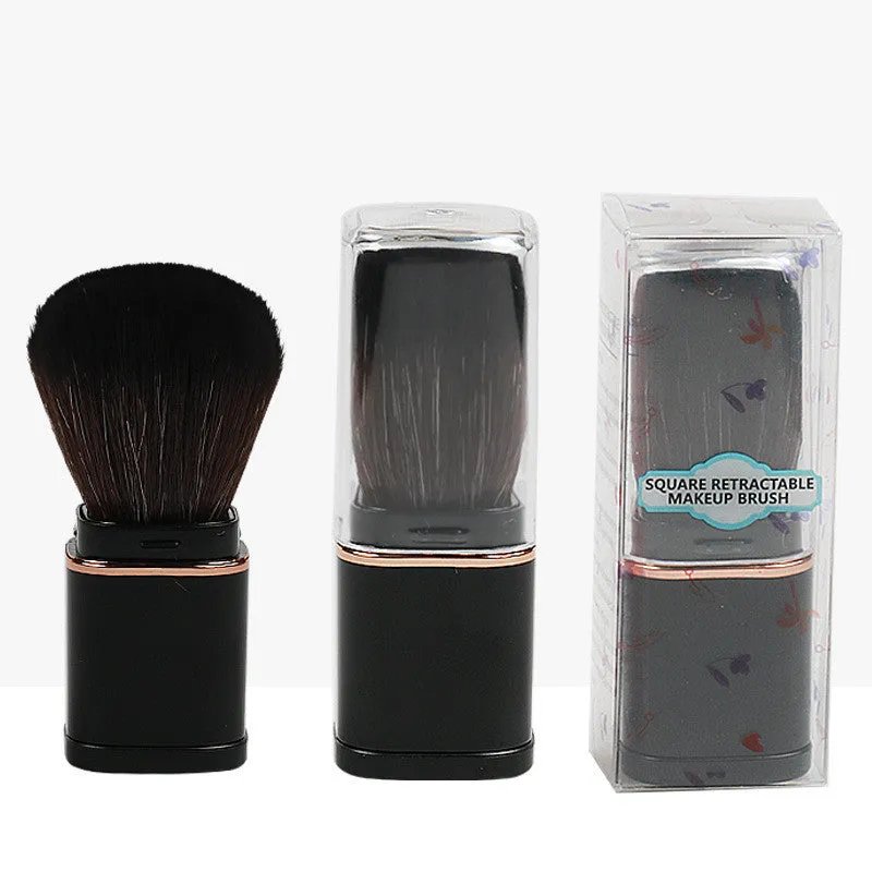 Portable retractable makeup brush with black telescopic handle and artificial fibre bristles for powder blusher application
