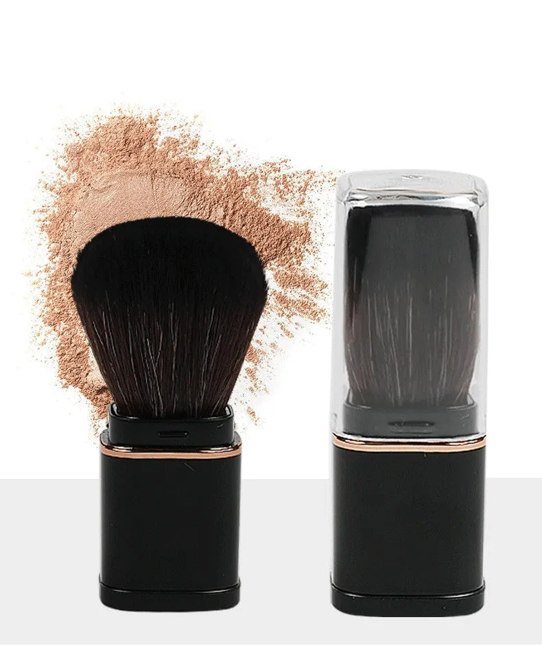 Portable retractable makeup brush with black telescopic handle and artificial fibre bristles for powder blusher application