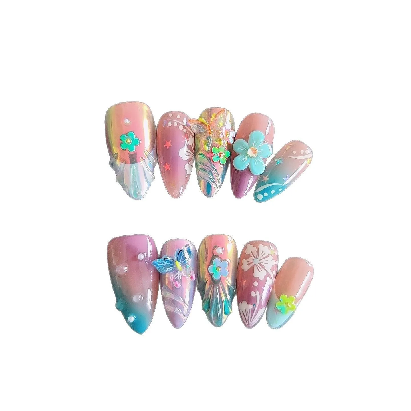 Handmade colourful embossed flower and butterfly nail art charms on a manicure set.