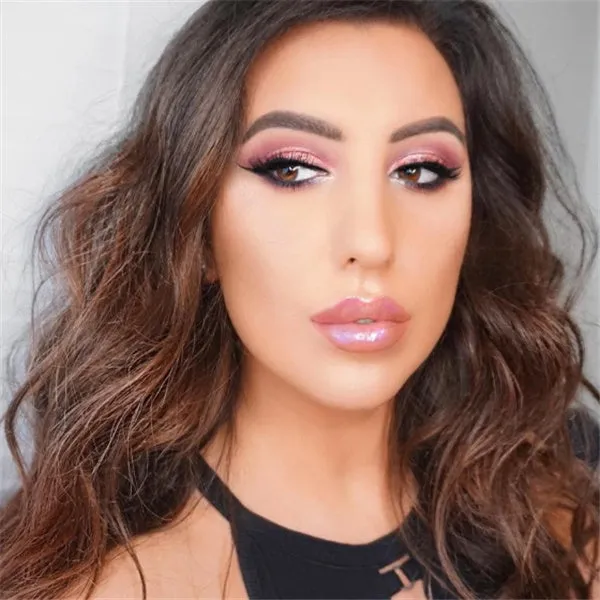 Polarized lip gloss in multiple shades with high-shine finish and wand applicator