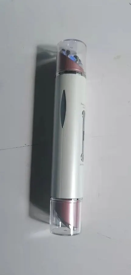 Piano white eye beauty instrument with USB cable, showing negative ion and ultrasonic wave modes