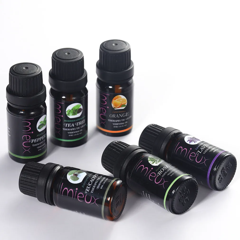 Six 10ml essential oil bottles in a row – tea tree, mint, sweet orange, eucalyptus, rosemary, lavender