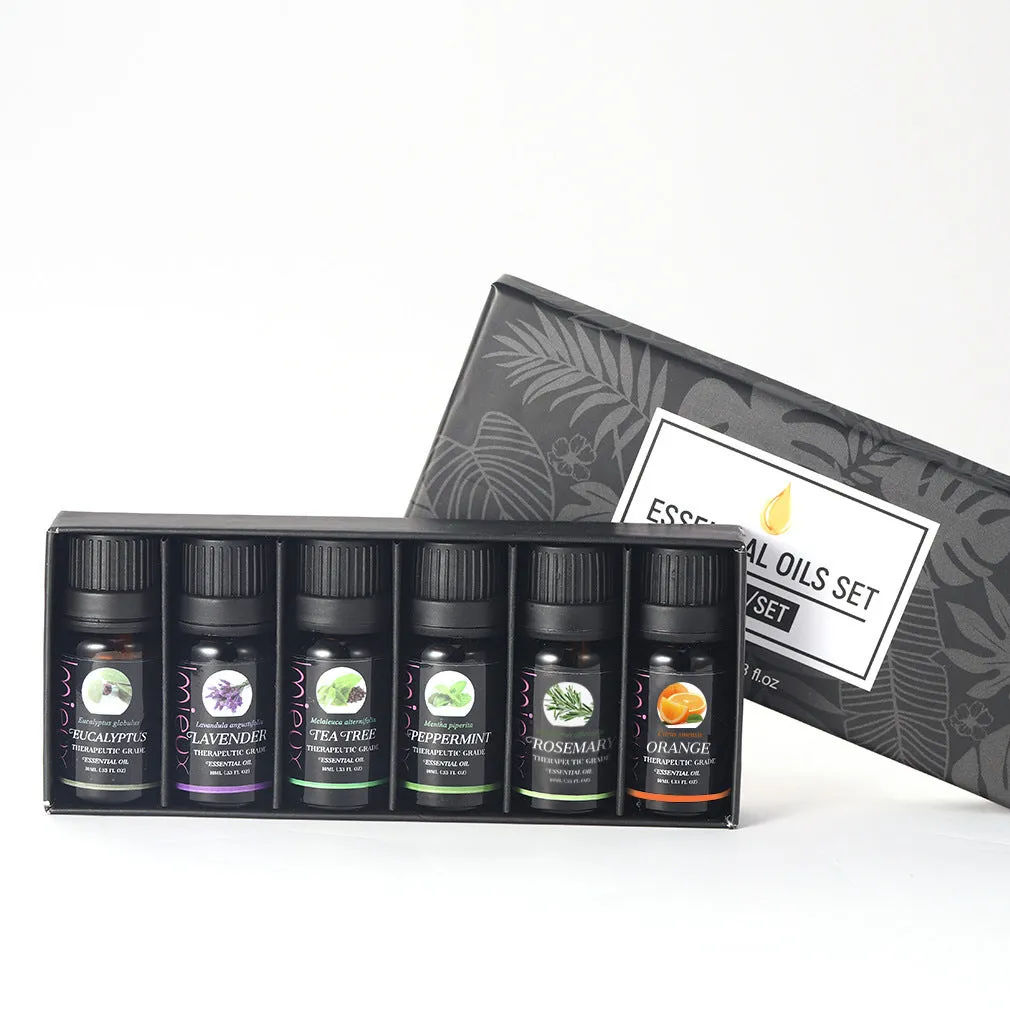 Six 10ml essential oil bottles in a row – tea tree, mint, sweet orange, eucalyptus, rosemary, lavender