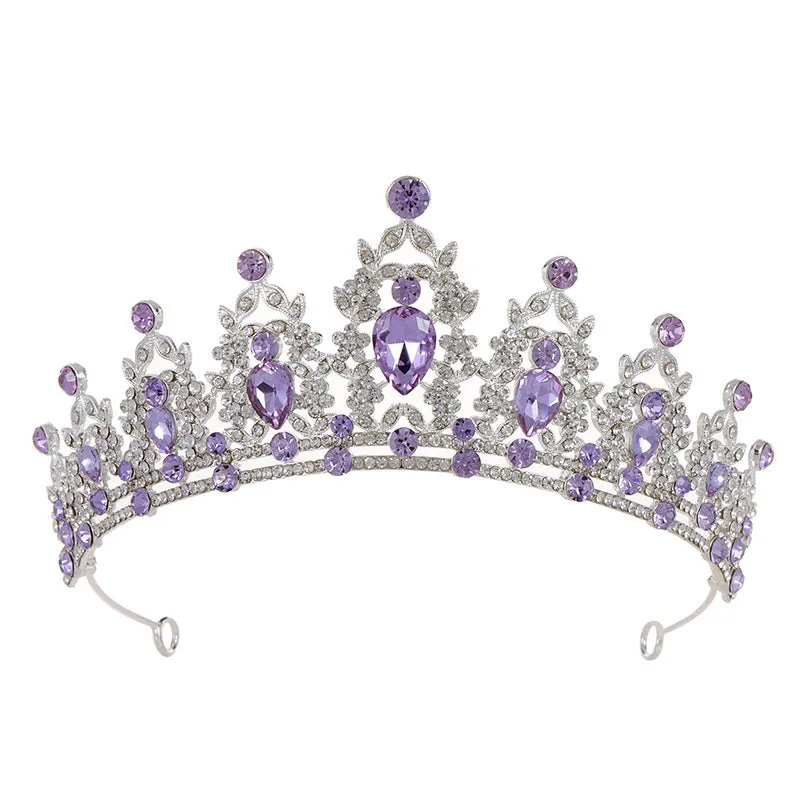 Baroque-style bridal crown hair accessory with rhinestones on an alloy frame in silver and gold colour options.