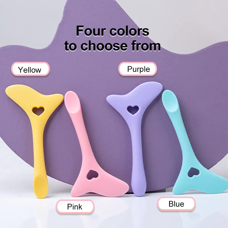 Four reusable silicone winged eyeliner stencils in pink, blue, purple, and yellow on a white background