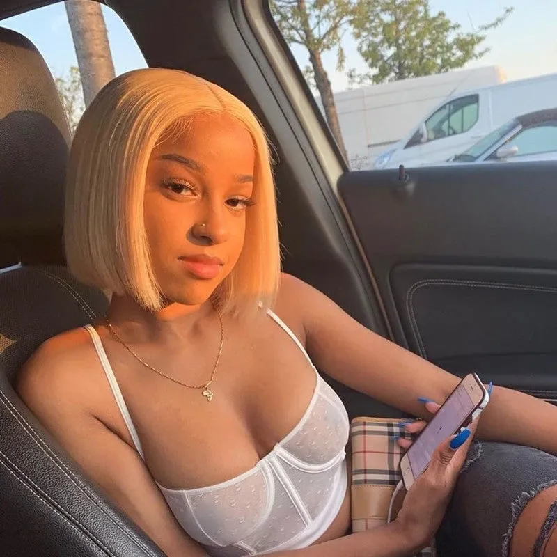 613 blonde straight human hair bob wig with T part on a mannequin head