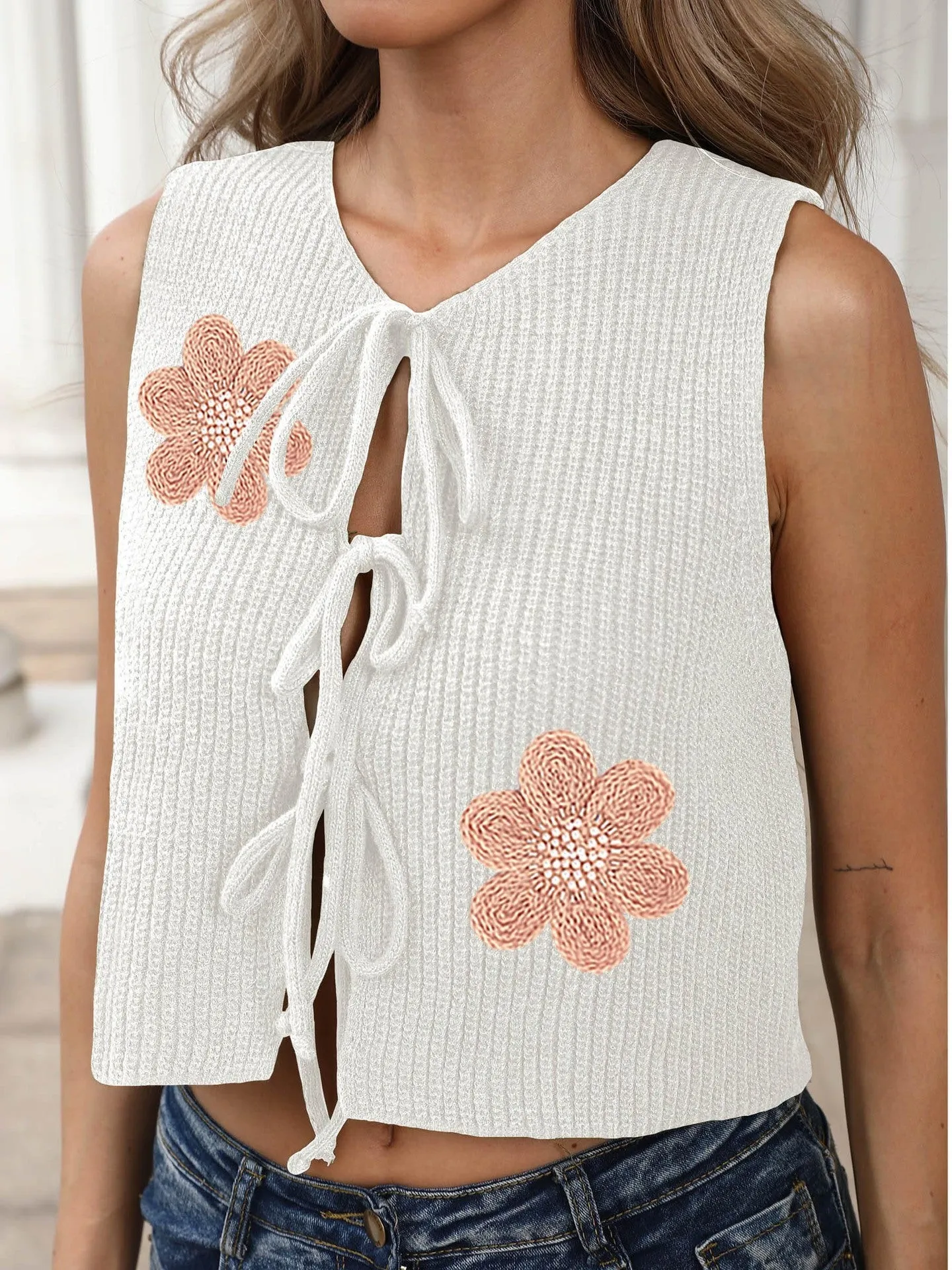 Women's army green sleeveless lace-up cardigan vest with bow detail and apricot flower accents.