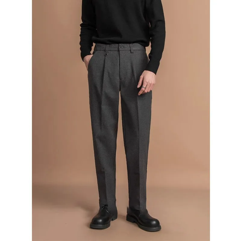 Men's straight-leg casual trousers in black with a draped design detail on the leg.