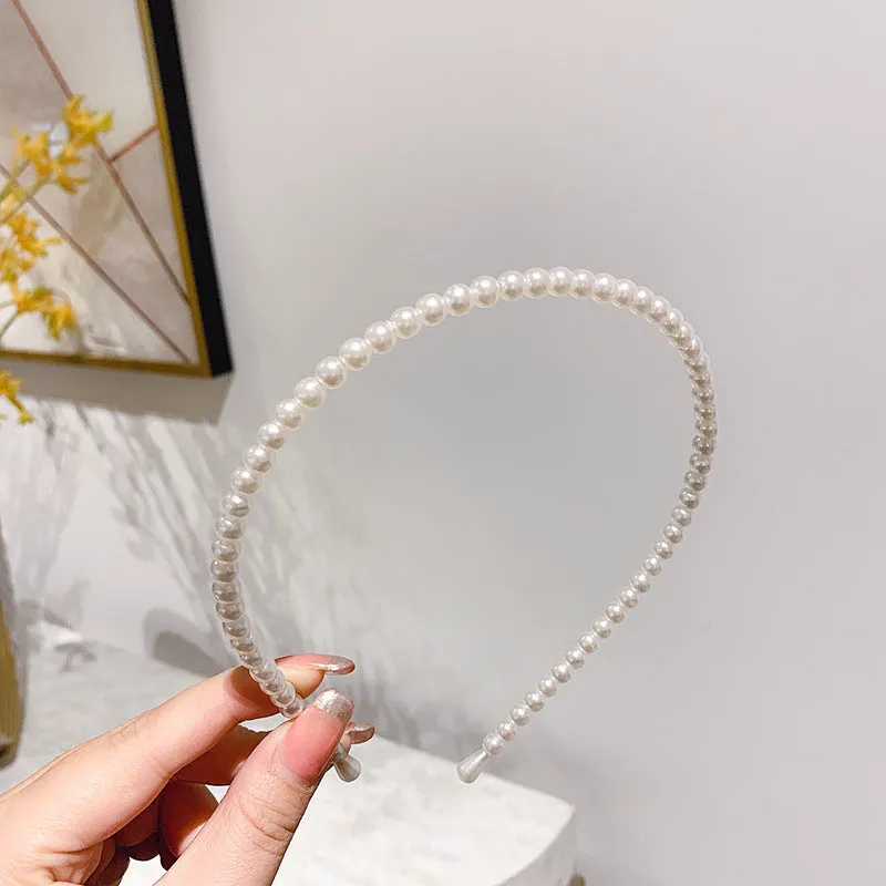 Thin pearl headband with imitation pearl and metal, 14cm length, three colour options on light background
