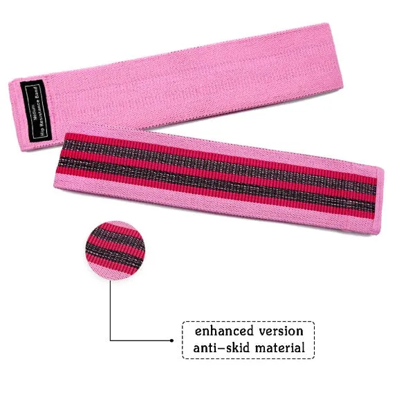 Fabric resistance bands set in lake blue, pink, and purple on a neutral background with net bag