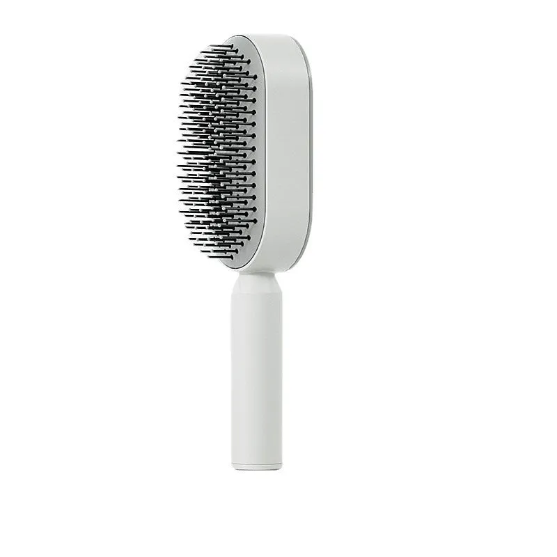 Automatic cleaning hair comb with 3D air cushion in pink, measuring 25x7x5cm, with ergonomic handle for scalp massage