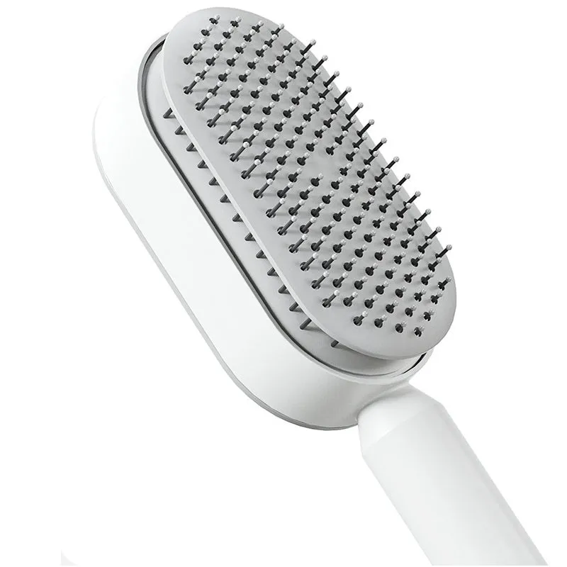 Automatic cleaning hair comb with 3D air cushion in pink, measuring 25x7x5cm, with ergonomic handle for scalp massage