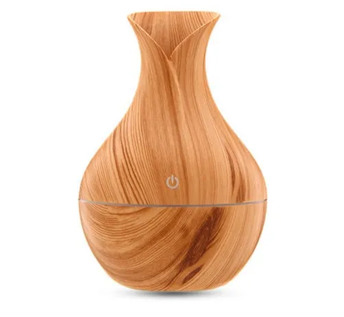Small vase humidifier with 130ml water tank in Crackle Mahogany finish, USB powered, on a wooden desk