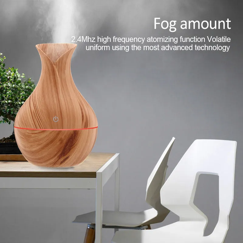 Small vase humidifier with 130ml water tank in Crackle Mahogany finish, USB powered, on a wooden desk
