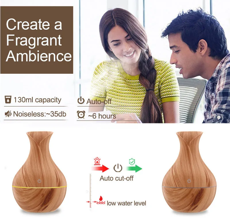 Small vase humidifier with 130ml water tank in Crackle Mahogany finish, USB powered, on a wooden desk