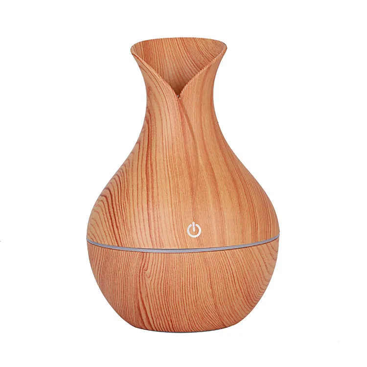 Small vase humidifier with 130ml water tank in Crackle Mahogany finish, USB powered, on a wooden desk